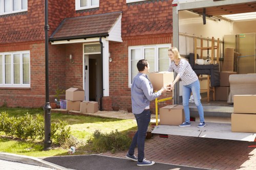 Local moving team helping a customer settle into a new home