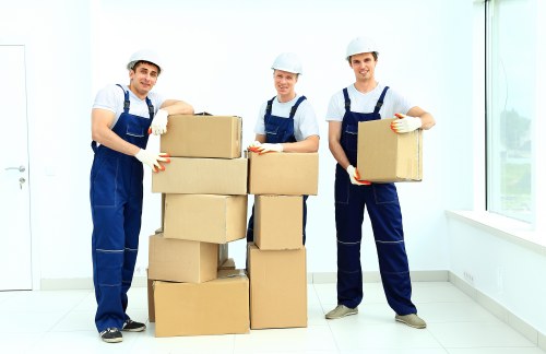 Professional movers handling household items during a Walthamstow relocation
