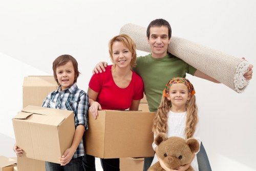 Loading household items into a van for a Walthamstow move