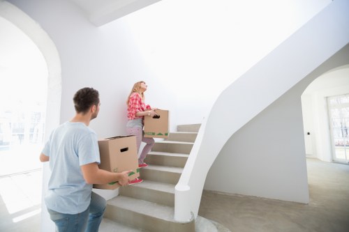 Team carrying furniture from a flat in Walthamstow