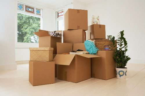 Local team collecting sofas, beds, and wardrobes from a Walthamstow property